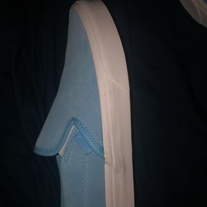 Baby blue slip on vans